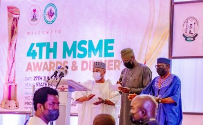 Ag. MD, Alwan Ali Hassan with other staff at the MSME award night in Abuja